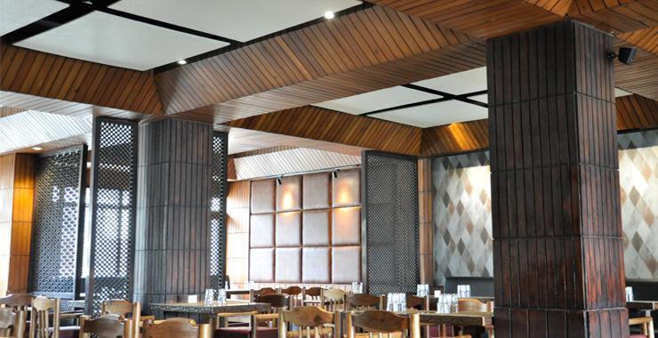 Dining area at Ahdoos Restaurant with traditional seating