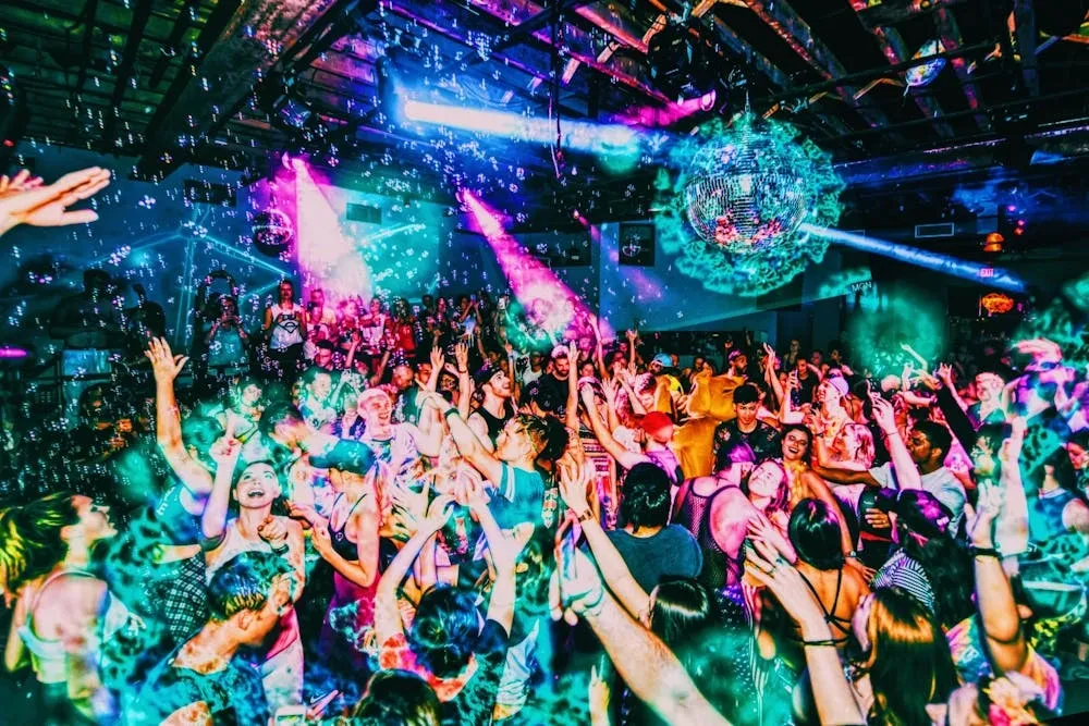 Nightclub dance floor scene in Almaty