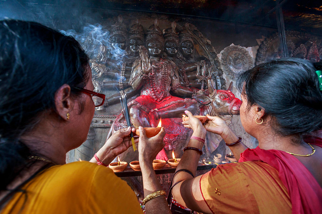 Women devotees at Ambubachi Mela seeking blessings