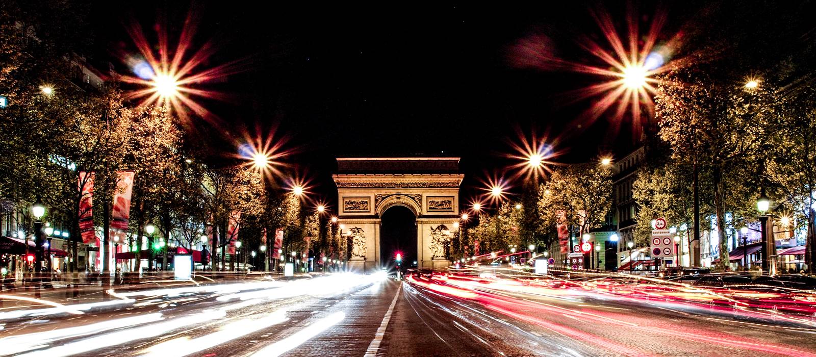 Evening avenue view near Arc de Triomphe and Champs Elysees