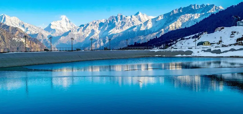 Auli mountain landscape with open meadow and cable car line