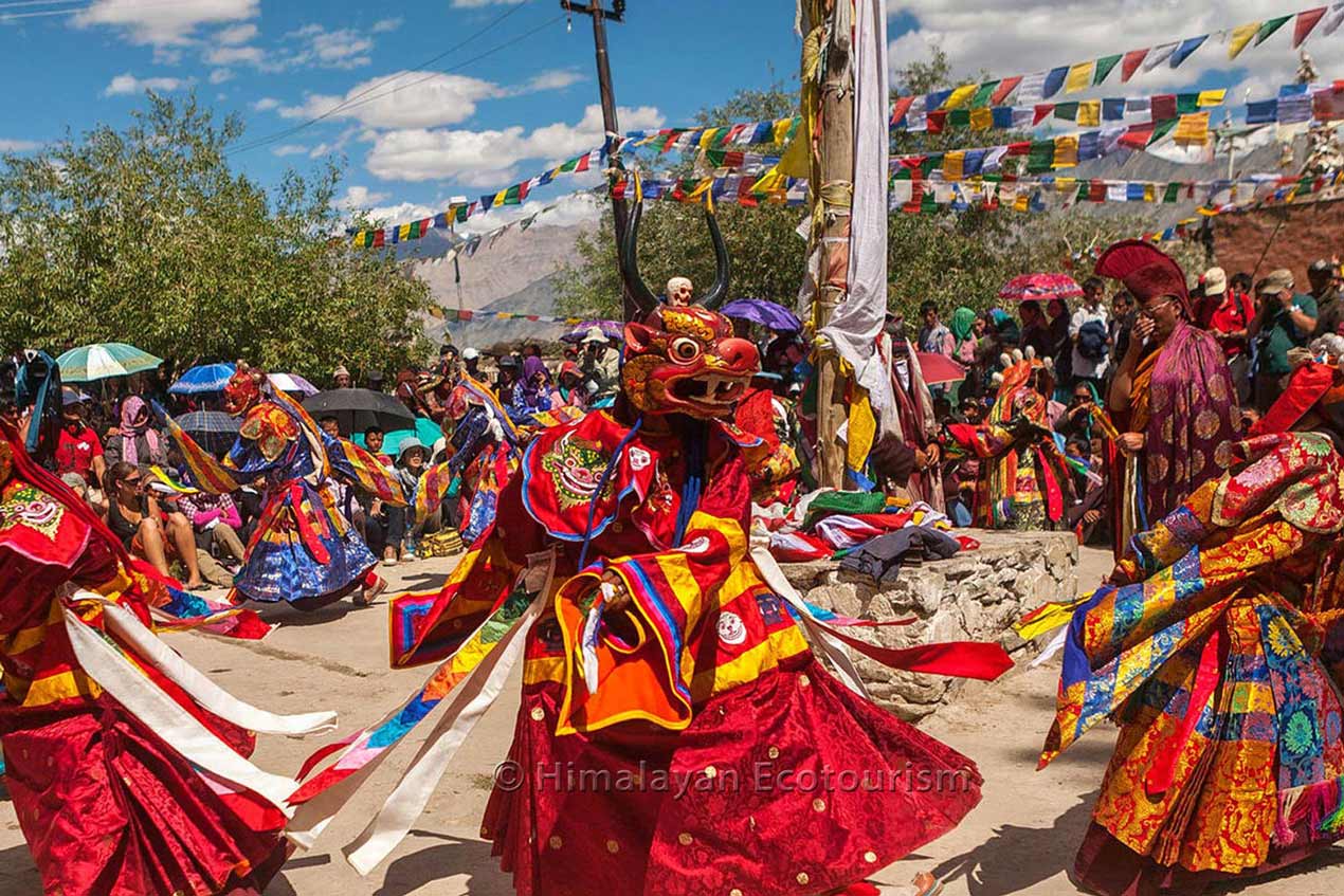 Ladakh festival atmosphere with monastery backdrop
