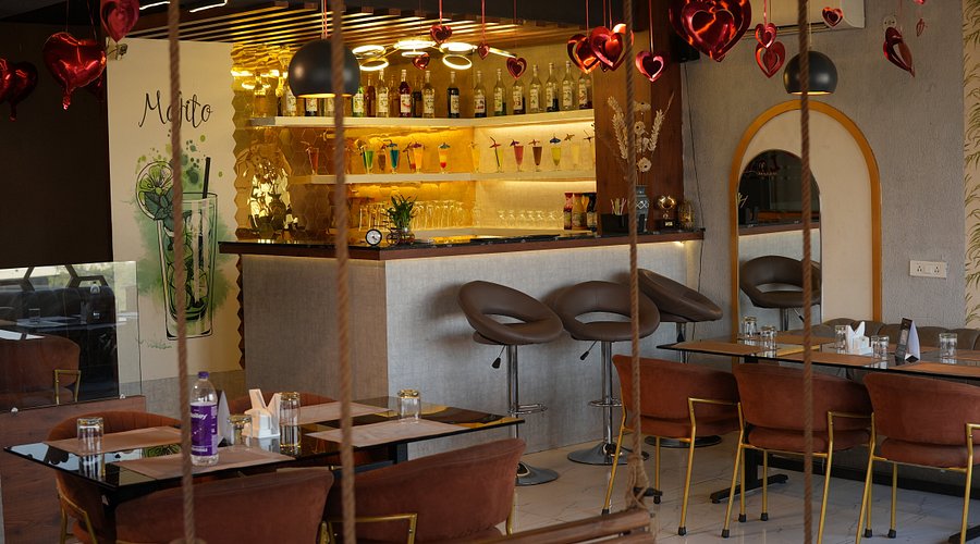 Modern cafe interior in Patna with comfortable seating and warm ambiance