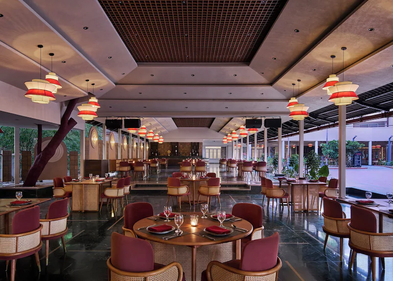 Cafe with scenic view of Silvassa Dam and peaceful waterfront seating