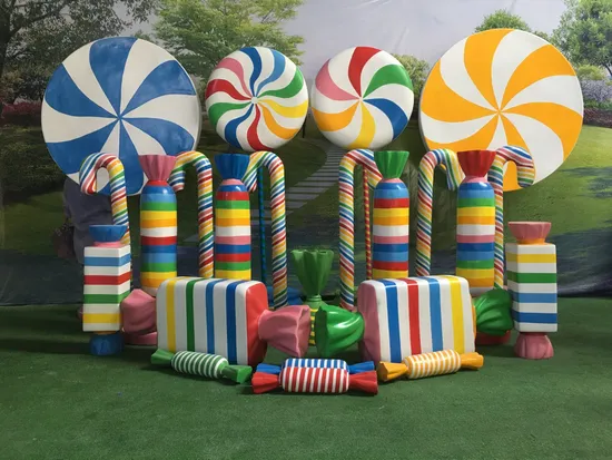 Giant candy sculptures at Candy Museum Dubai including oversized lollipops and donuts
