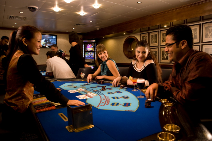 Casino table games including roulette and blackjack in action