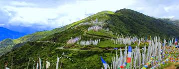 Prayer flags and mountain panorama at Chele La Pass Bhutan