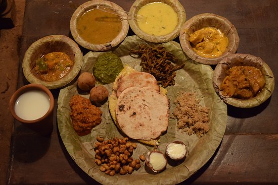 Traditional Rajasthani thali food served at Chokhi Dhani Village