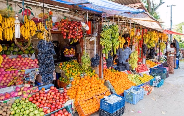 Local stalls and shopping activity at Connemara Market Kerala