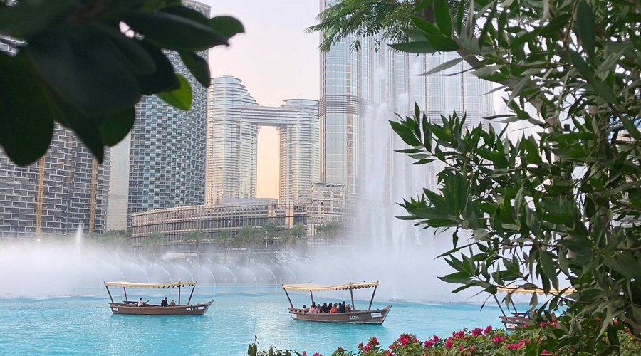 Dubai Fountain show at night with Burj Khalifa in background