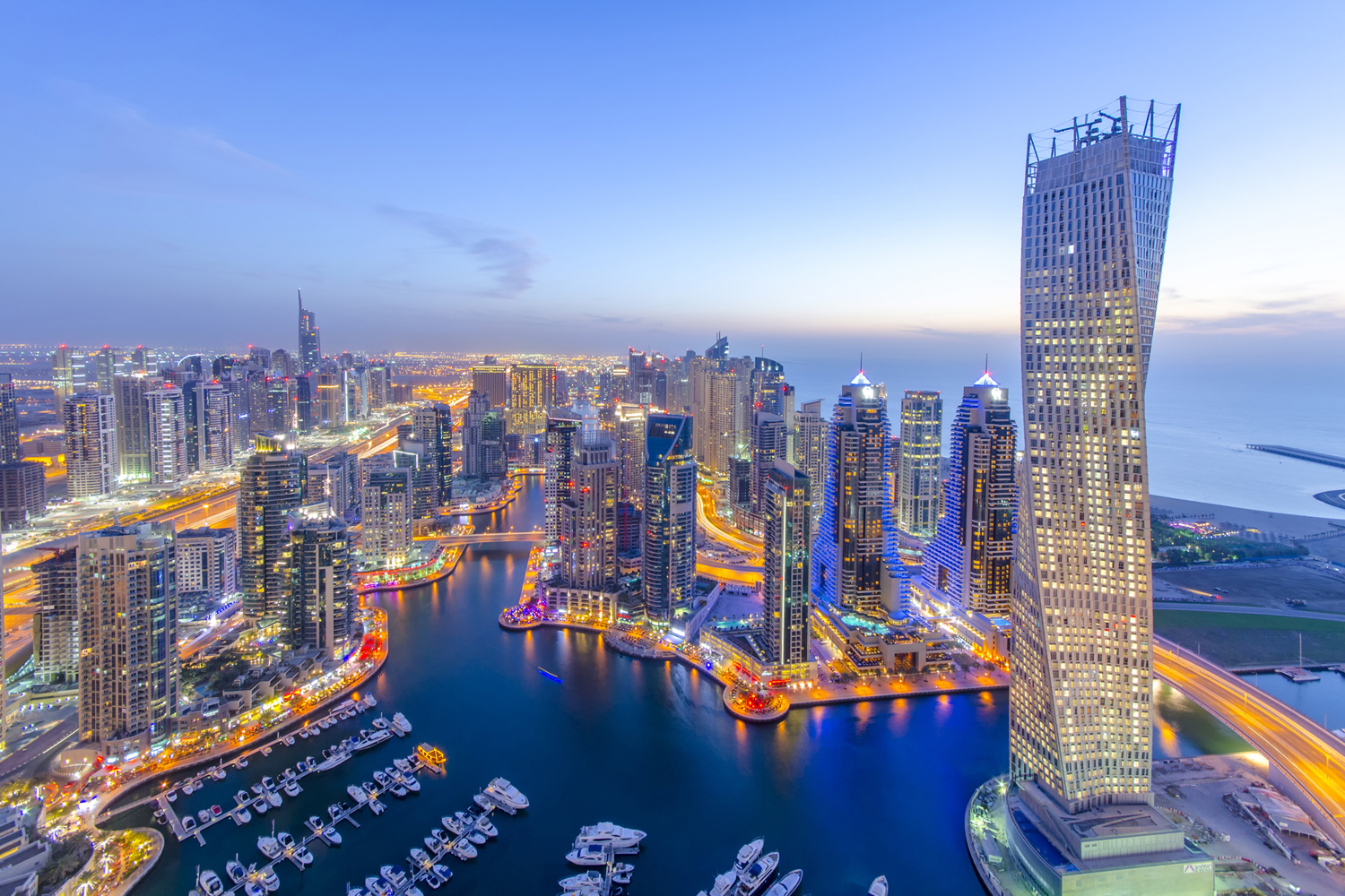 Dubai Marina skyline with luxury yachts and skyscrapers