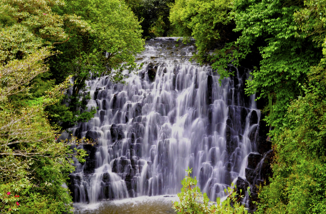 Elephant Falls during monsoon season with powerful water flow cascading down