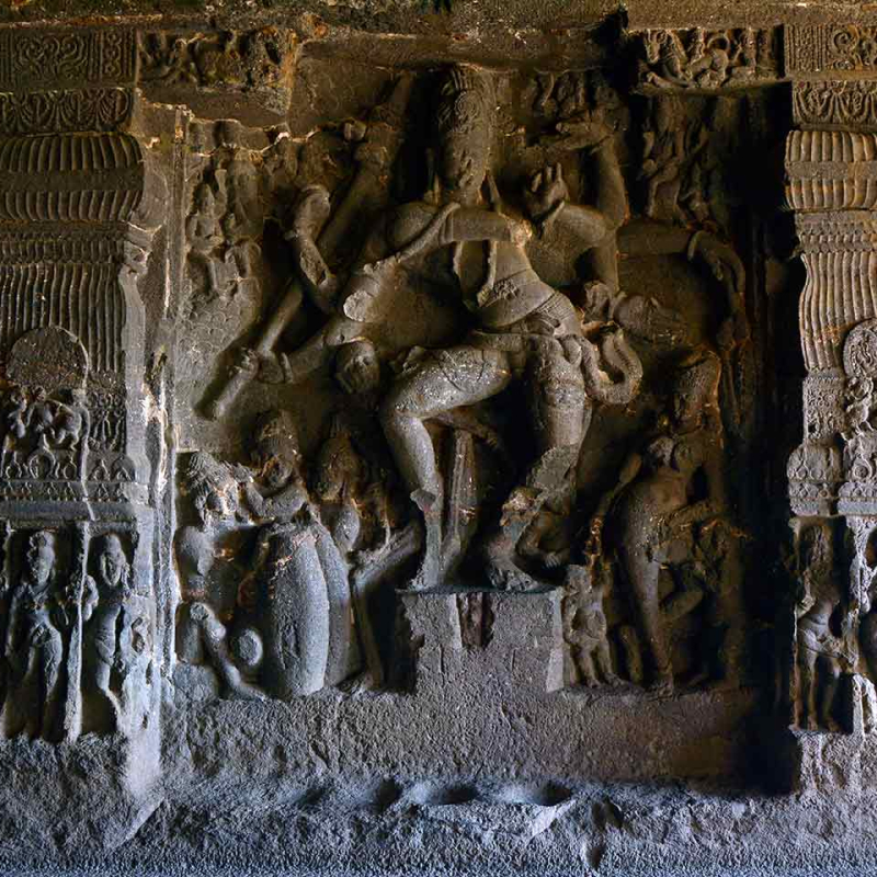 Artisans carving Ellora Caves using traditional tools