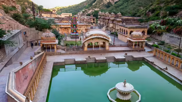 Galtaji Temple Jaipur complex in Aravalli hills with heritage temple facades and sacred kunds