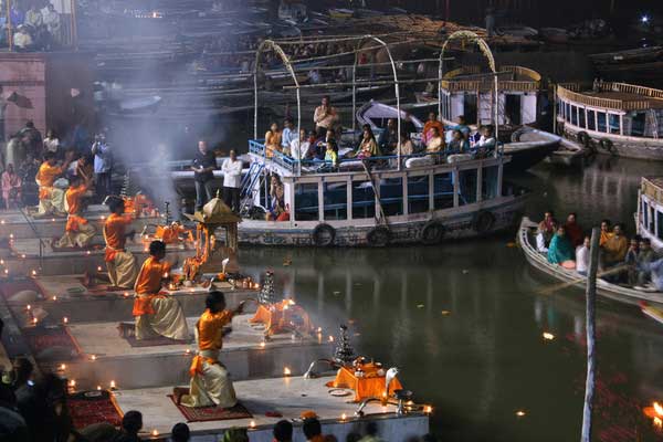 Comparison of boat view and ghat view for Ganga Aarti in Varanasi