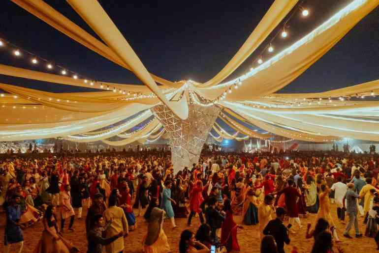 Garba dancers in traditional attire performing in Ahmedabad during Navratri