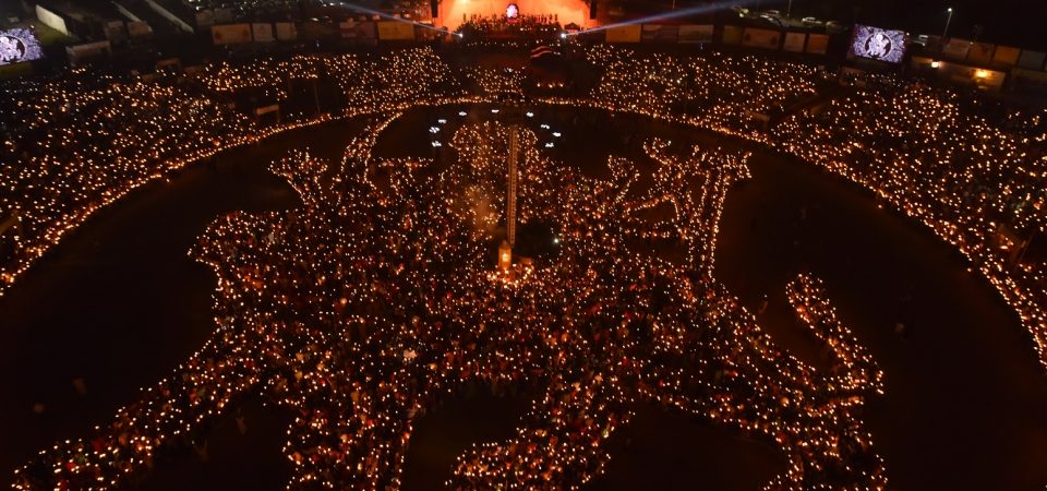 Large Navratri Garba venue setup in Ahmedabad with dancers and stage lights