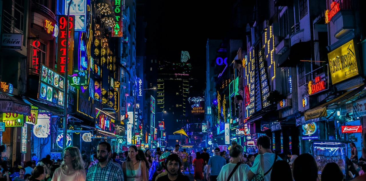 Vietnam nightlife city lights and crowded evening street scene