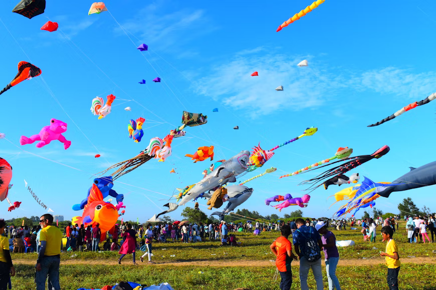 Colorful kites flying over Ahmedabad during Uttarayan