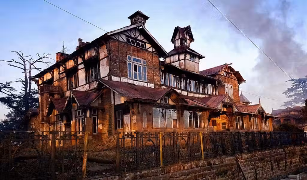 Foggy evening view of colonial architecture in Shimla