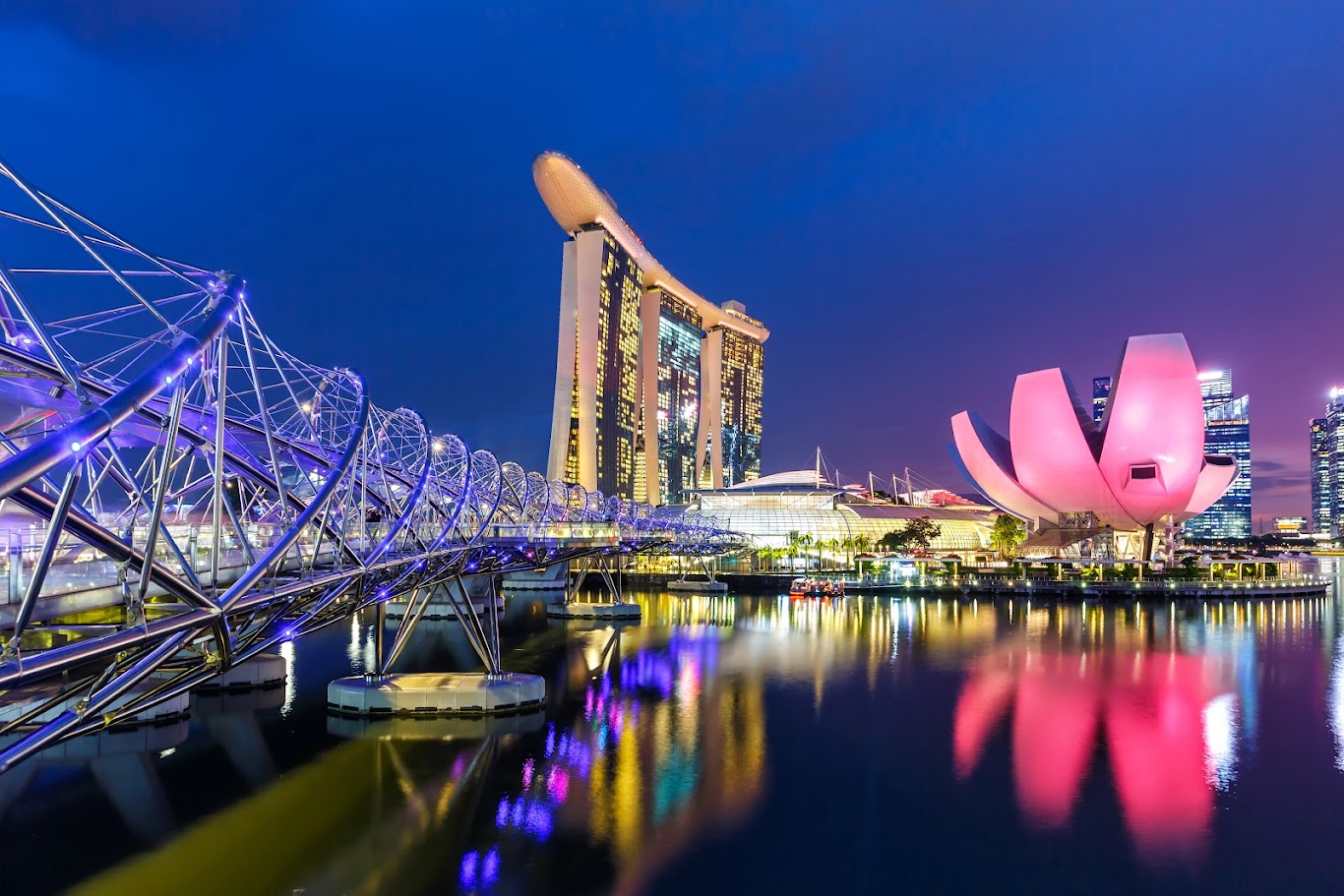 Helix Bridge with Marina Bay skyline at twilight