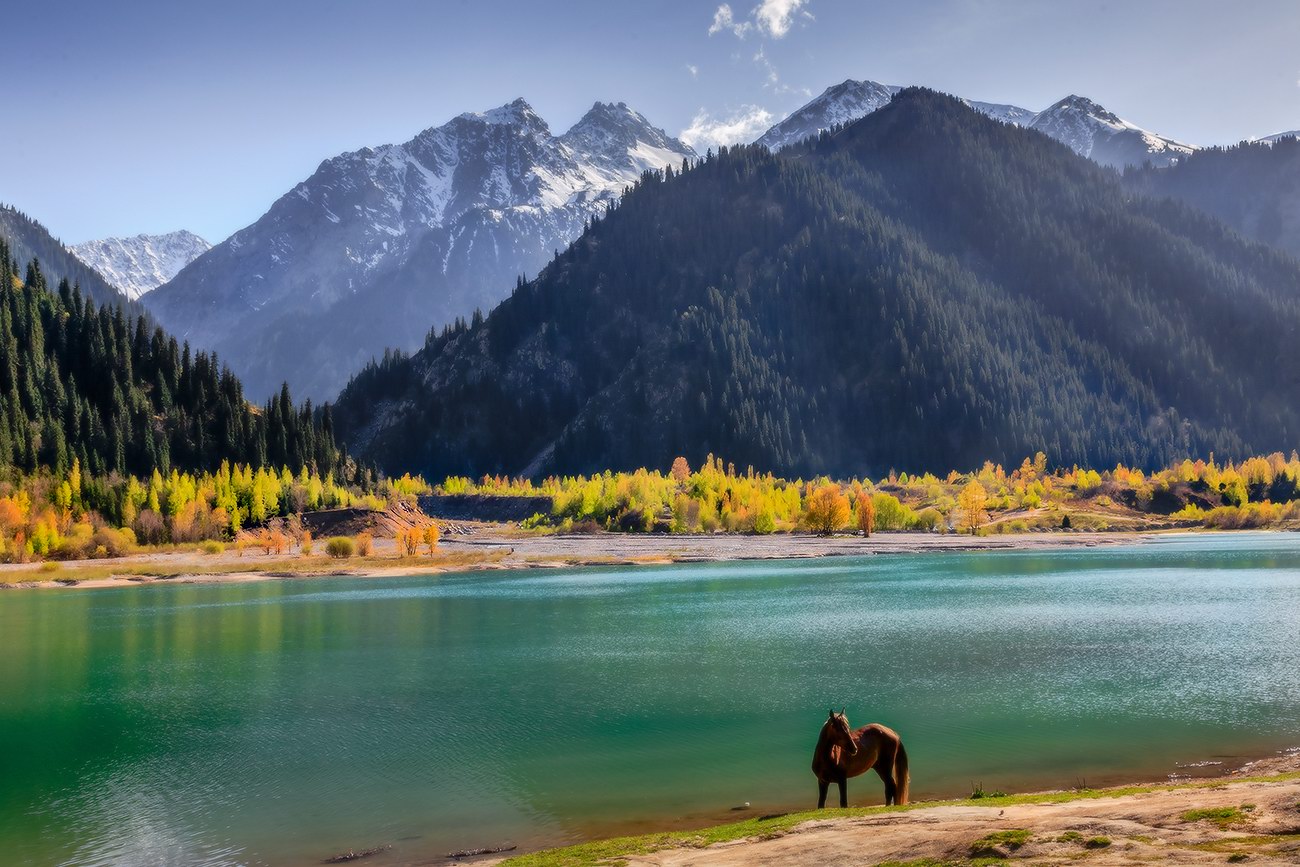 Lake Issyk surrounded by mountains in Kazakhstan