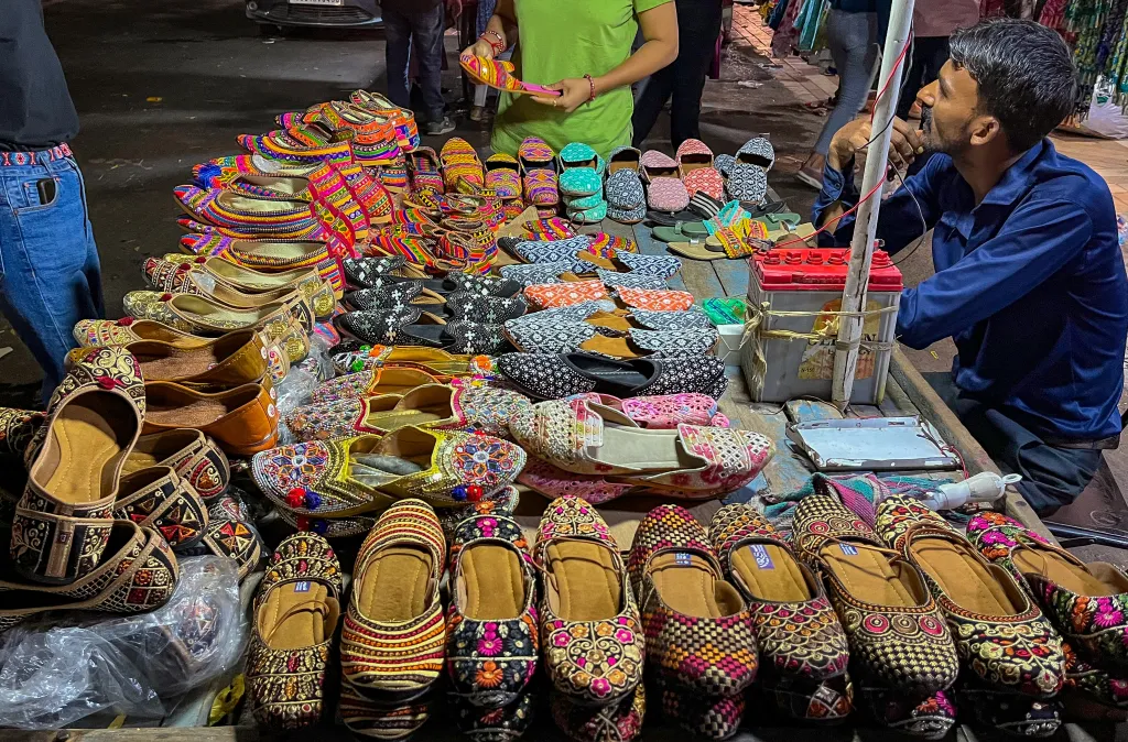 Gujarati handicrafts and mirror-work products in Law Garden market
