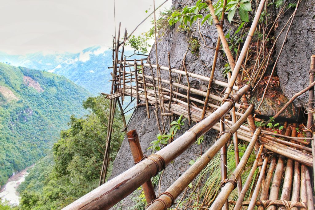 Mawryngkhang bamboo trek path along steep valley edges in Meghalaya