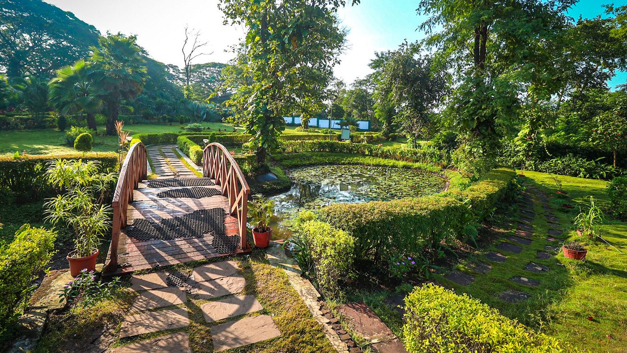 Nakshatra Garden Silvassa pathway with landscaped greenery and themed sections