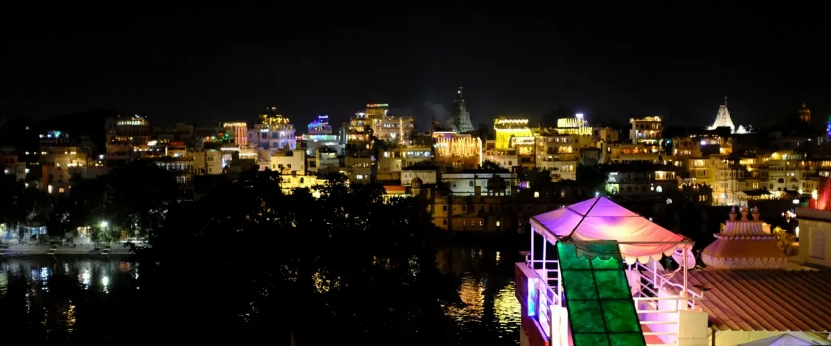 New Year celebration lights and lakeside venue in Udaipur