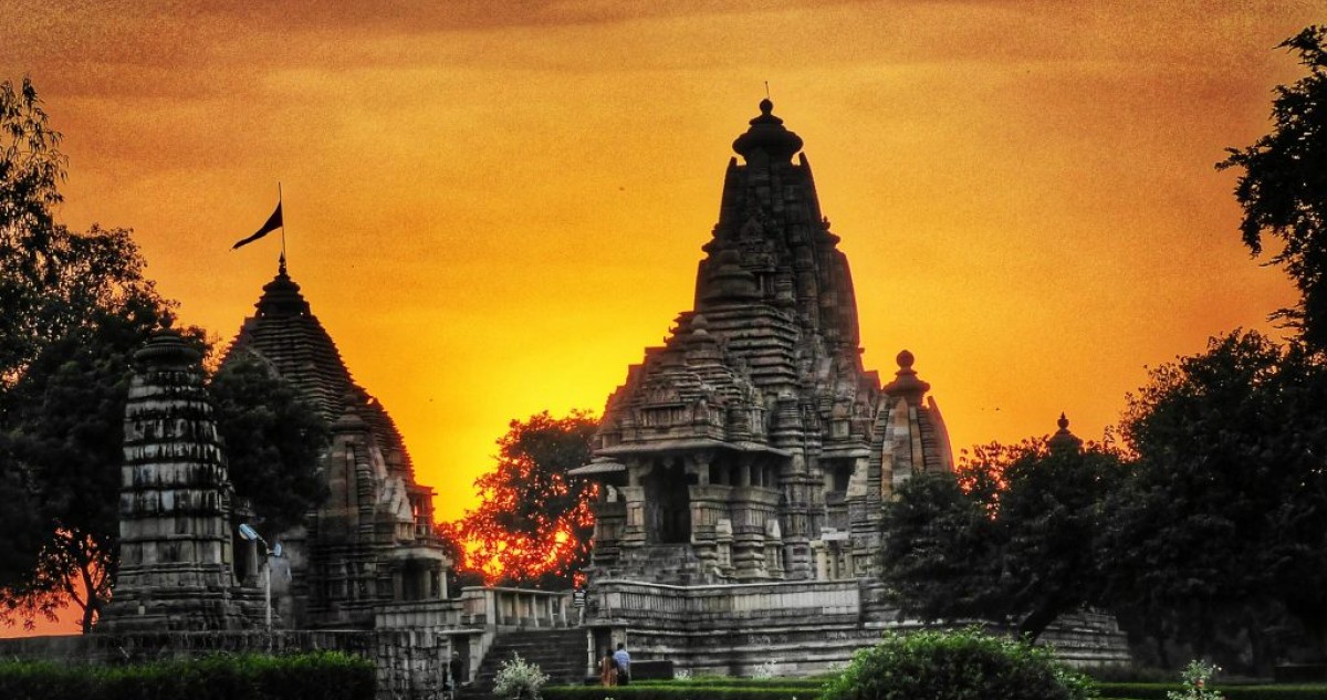 Sunset silhouette of Khajuraho temple spires