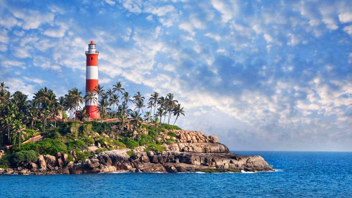 Kovalam Kerala beach coastline with palms and Arabian Sea views