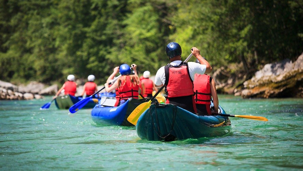 River rafting experience in Kerala with lush surroundings