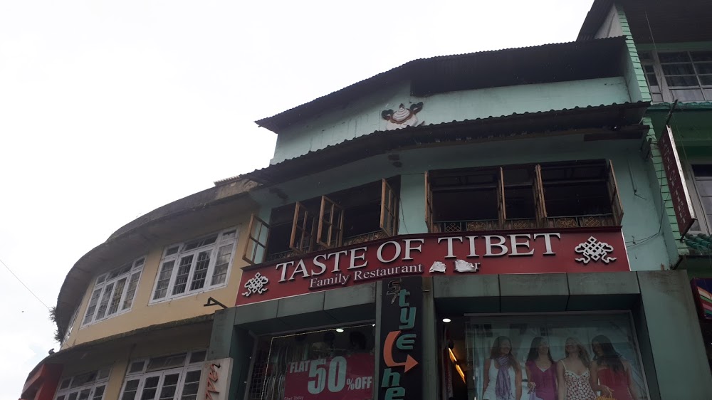 Taste of Tibet storefront and MG Marg surroundings in Gangtok