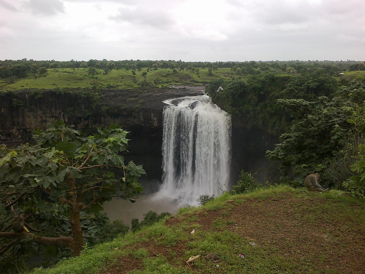 Tincha Falls near Indore during monsoon with lush green valley backdrop