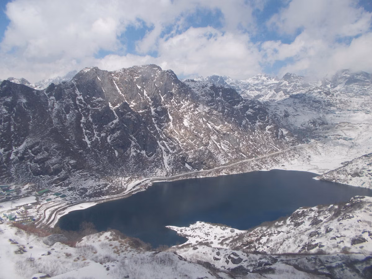Cold desert terrain and blue water at Tso Lhamo Lake