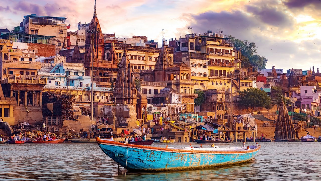 Varanasi ghats with sunrise over River Ganges