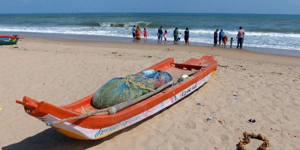 Fishing boats and village activity at Veerampattinam coast