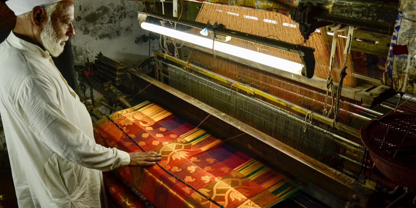Artisan weaving Banarasi saree on traditional handloom in Varanasi