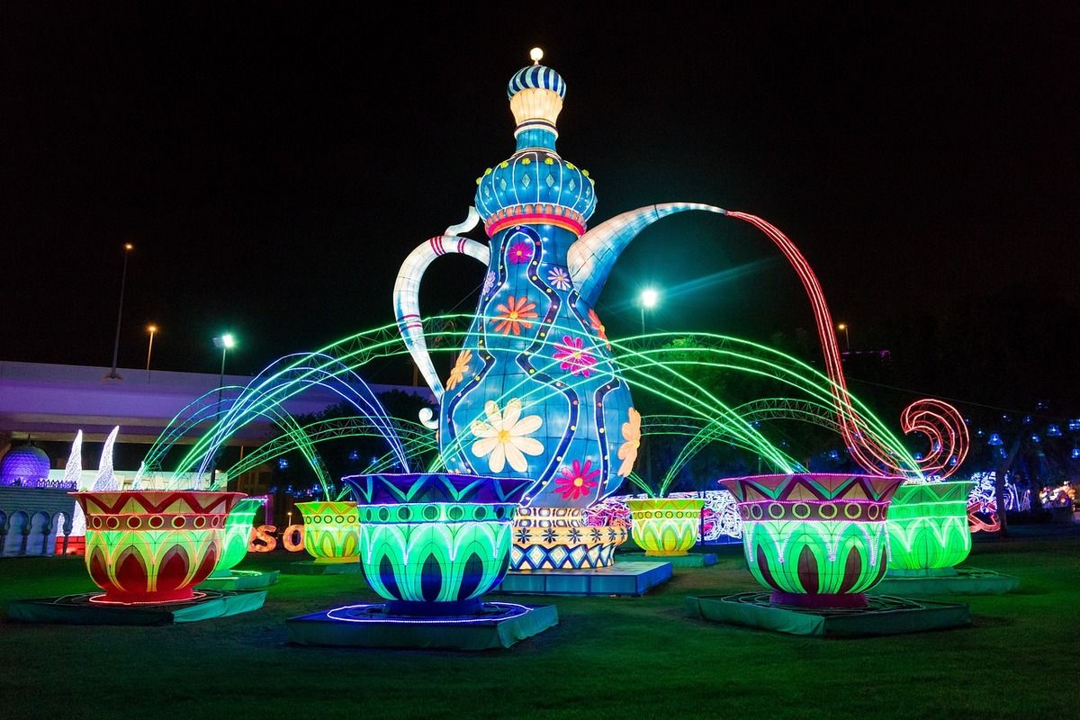 Zabeel Park illuminated at evening with visitors